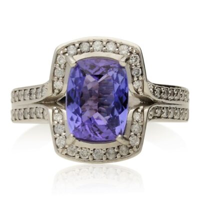 PRE-OWNED 18CT WHITE GOLD TANZANITE & DIAMOND CLUSTER RING.