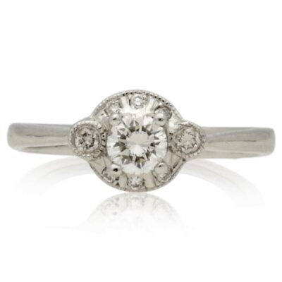 PRE-OWNED NATURAL DIAMOND HALO CLUSTER RING .33CTS
