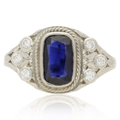 PRE-OWNED PLATINUM SAPPHIRE & DIAMOND TREFOIL CLUSTER RING - 2010