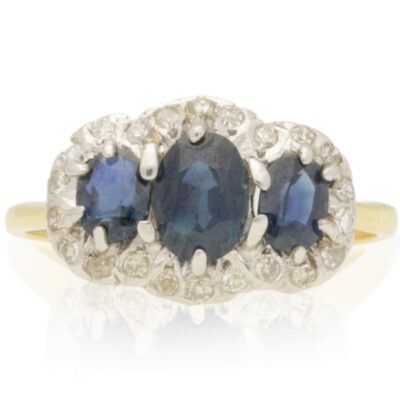 VINTAGE 18CT GOLD SAPPHIRE & DIAMOND BOAT SHAPED GALLERY CLUSTER RING - 1979