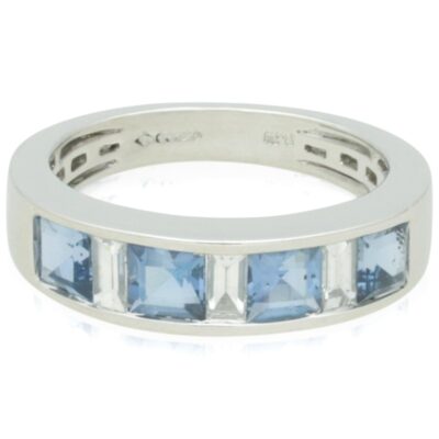 PRE-OWNED PLATINUM AQUAMARINE & DIAMOND ETERNITY RING - 2013